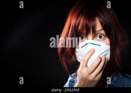 Girl wearing protective mask