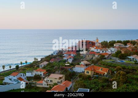 Aerial view of typical Madeira island village at twilight. Paul do Mar, Madeira, Portugal Stock Photo