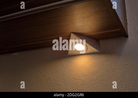 recessed lighting, downlighting on cupboard, modern design lamp for home Stock Photo