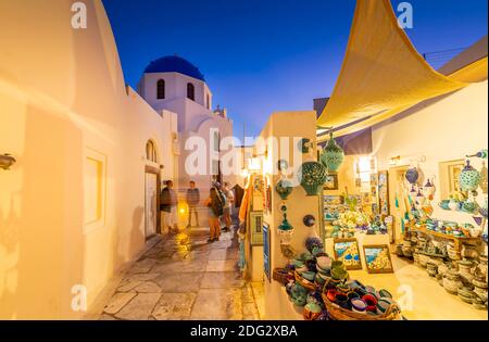 View of church and souvenir shop in Oia at dusk, Santorini, Greek Islands, Greece, Europe Stock Photo