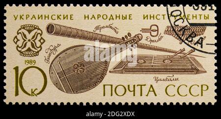 MOSCOW, RUSSIA - NOVEMBER 10, 2018: A stamp printed in USSR (Russia) shows Ukrainian bandura, tsimbaly, trembita, svyril and drymba, Musical Instrumen Stock Photo