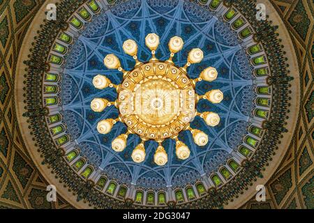 Muscat, Oman, December 3, 2016: The chandelier in the main prayer hall of the Sultan Qaboos Grand Mosque in Muscat, Oman Stock Photo