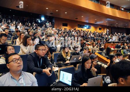 Members of the audience listen to chinese biologist He Jiankui, who gives a presentation at Hong Kong University during the Second International Summit on Humane Genome Editing. He had biologically altered the genome of two twins in an attempt to make them resistant to AIDS, which their biological father had. He was condemned by the scientific community, and was taken into custody immediately after his talk and was eventually jailed. Stock Photo
