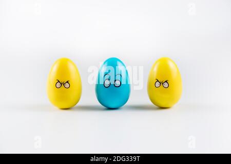 Three Colorful Plastic Easter Eggs on white background. Stock Photo