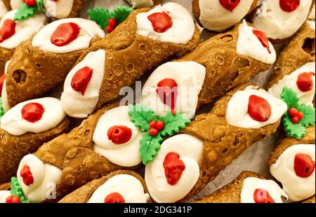 Assortment of Sicilian Cannoli with ricotta cheese. Cannolo Siciliano, symbol of Sicily. Traditional italian dessert Stock Photo