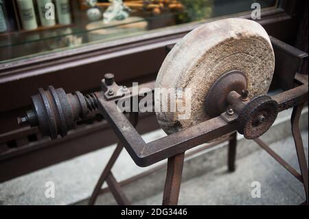 Old Sharpening Stone Wheel Stock Photo, Picture and Royalty Free