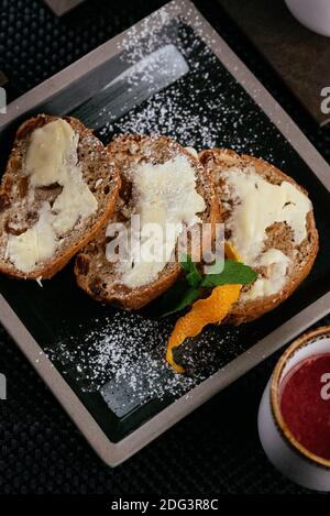 various desserts with tea on a black background Stock Photo