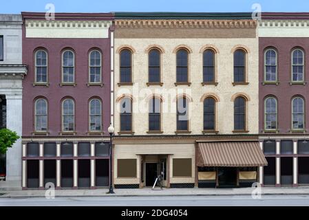 Old fashioned small town main street buildings, with stores on ground ...