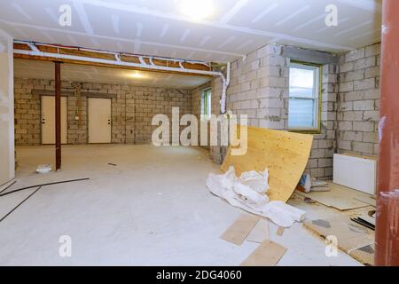 New residential construction home framing with basement unfinished view Stock Photo