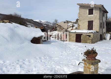 The house of a farmer destroyed by the earthquake near Amatrice on February 1, 2017. The area of Amatrice is coping with the snow and with the aftermath of an earthquake in August that killed nearly 300 people. In Amatrice hundreds of animal were injured and killed when the stables collapsed during the earthquakes of these last five months. And these last weeks central Italy experienced the worst snow in more than 50 years. Some 3,000 farms are said to be in danger across central Italy, in the regions of Lazio, Marche, Umbria and Abruzzo. More than 90 percent of the farms are family holdings. Stock Photo