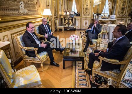 French President Francois Hollande (L) along with his Diplomatic Advisor Jacques Audibert (2nd L) receives Indian business magnate and Reliance Group chairman Anil Ambani (R) at the Elysee Palace in Paris, France on February 21, 2017. Photo by Hamilton/Pool/ABACAPRESS.COM Stock Photo