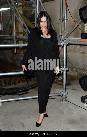 Beatrice Dalle arriving at the Saint Laurent show during Paris