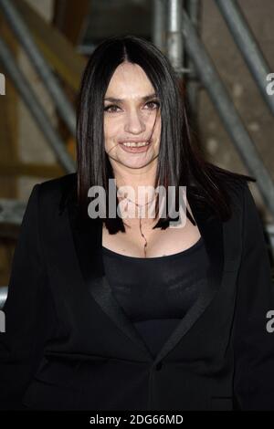 Beatrice Dalle arriving at the Saint Laurent show during Paris