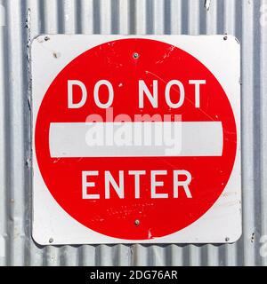 Do not enter sign on a corrugated iron wall Stock Photo