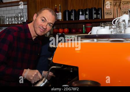 Melbourne, Australia, 1 June, 2020.  The Avenue Food Store's owner, Yarra, is busy making coffees as he  opens his doors to customers after 3 months on 01 June, 2020 in Melbourne, Australia. Victoria is open for business as cafes, bars and restaurants once again open their doors for a maximum of 20 sit down patrons from today. The Victorian Premier Daniel Andrews, announced on the 16th May that all cafes, restaurants and bars will  be able to reopen for up to 20 patrons per enclosed space from the 1st of June and then a further easing of restrictions to 50 patrons on the 22nd of June. It comes Stock Photo