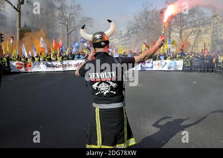 Firefighters march during a demonstration of French firemen against staff reduction in Paris, France, on March 14, 2017. Photo by Alain Apaydin/ABACAPRESS.COM Stock Photo