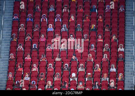 Cardboard cutouts of fans are seen in the stands of the Los Angeles Memorial Coliseum during an NCAA football game between the Southern California Tro Stock Photo