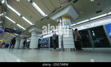 People on underground station in Seoul, South Korea Stock Photo