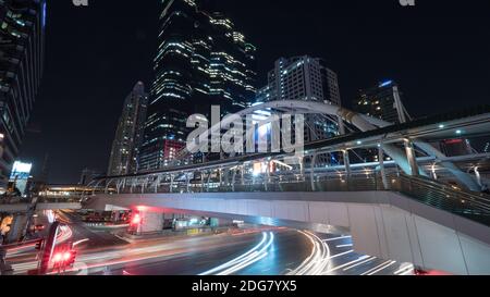 Road and pedestrian overpass in night Bangkok Stock Photo