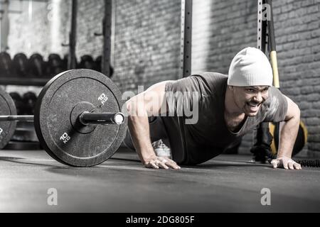 Pushup workout in gym Stock Photo