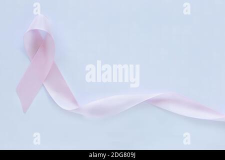 Lilac ribbon on white background. Cancer awareness concept Stock Photo -  Alamy