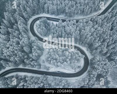 Beautiful winter road seen from above. Aerial photography. Location: Transylvania,Romania Stock Photo