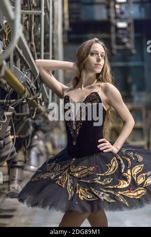 Ballerina posing in interior Stock Photo