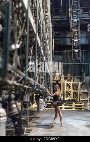 Ballerina posing in interior Stock Photo