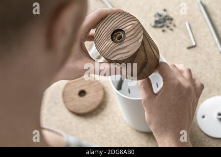 Lamp assembling in workshop Stock Photo