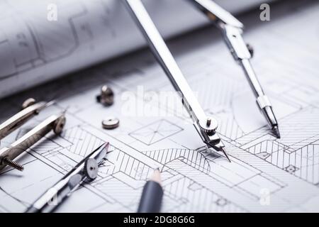 Compass and several drawing tools available in the drawings. Design and working drawings with pencils, rule and compasses. selective focus Stock Photo