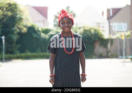 Portrait confident boy in traditional African clothing Stock Photo