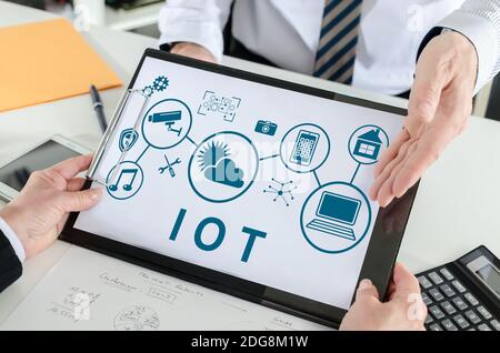 Iot concept shown by a businessman Stock Photo