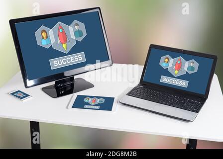 Business success concept shown on different information technology devices Stock Photo
