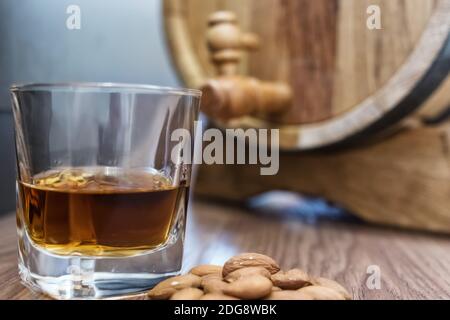 Wooden oak barrel for home production whiskey Stock Photo
