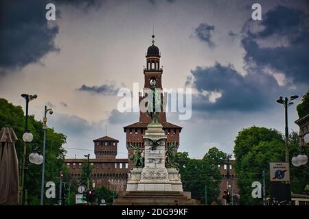 A giant Giuseppe Garibaldi Monument, Monumento a Giuseppe Garibaldi in front of Sforza Castle, Castello Sforzesco in Milan Stock Photo