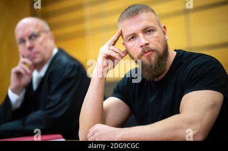 Viersen, Germany. 08th Dec, 2020. The rapper Kollegah (r), whose civil name is Felix Blume, sits next to his lawyer Christof Miseré at the local court. Blume is on trial for illegal possession of firearms. Credit: Jonas Güttler/dpa/Alamy Live News Stock Photo