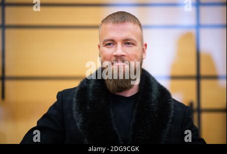 Viersen, Germany. 08th Dec, 2020. The rapper Kollegah, whose civil name is Felix Blume, sits in the district court. Blume is on trial for illegal possession of guns Credit: Jonas Güttler/dpa/Alamy Live News Stock Photo