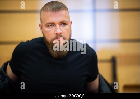 Viersen, Germany. 08th Dec, 2020. The rapper Kollegah, whose civil name is Felix Blume, sits in the district court. Blume is on trial for illegal possession of guns Credit: Jonas Güttler/dpa/Alamy Live News Stock Photo