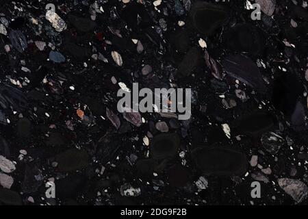 Black Marinace - natural polished dark granite stone slab, texture for perfect interior, background or other design project. Stock Photo