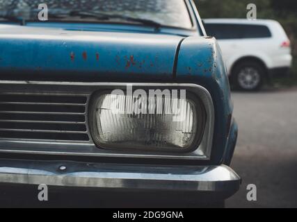 Front view of blue rusty old retro automobile Stock Photo