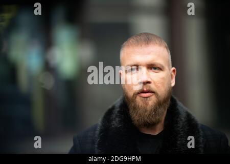 Viersen, Germany. 08th Dec, 2020. The rapper Kollegah, whose civil name is Felix Blume, is standing before the district court after his acquittal. Blume was on trial for illegal possession of guns Credit: Jonas Güttler/dpa/Alamy Live News Stock Photo