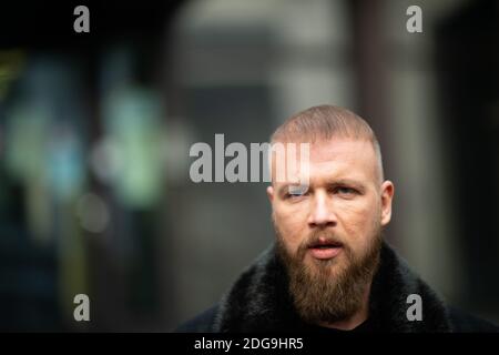 Viersen, Germany. 08th Dec, 2020. The rapper Kollegah, whose civil name is Felix Blume, is standing before the district court after his acquittal. Blume was on trial for illegal possession of guns Credit: Jonas Güttler/dpa/Alamy Live News Stock Photo