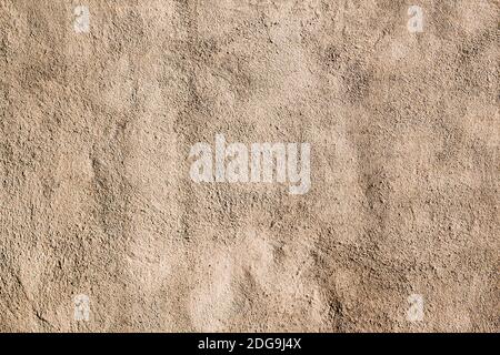 Beige colored abstract wall texture background in different shades of cream or beige Stock Photo