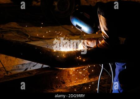 A closeup shot of a welder working Stock Photo