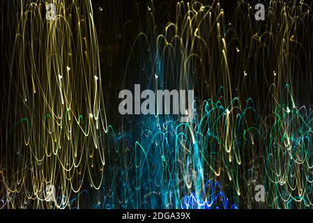 Bright abstract strip patterns from light strips on a black background Stock Photo