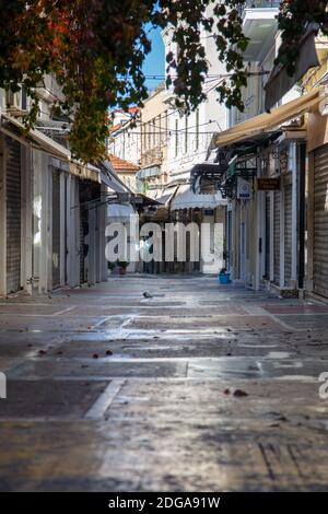 Athens, Greece. December 5 2020. Shops closed, empty street in Plaka, city center. Coronavirus pandemic lockdown Stock Photo