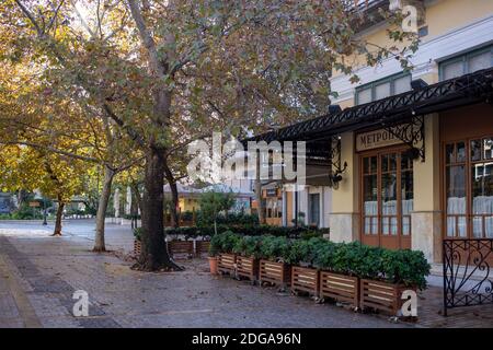 Athens city center, Greece. December 5 2020. Shops closed on empty cobblestone street, winter day. COVID 19 pandemic lockdown Stock Photo