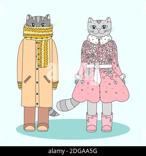 Humanized winter cats. Two cute cartoon kitties dressed in warm clothes. Outline color filled vector illustration Stock Vector