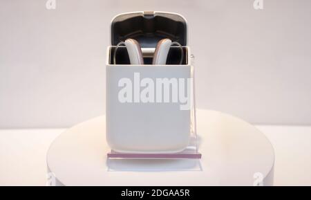 Modern hearing aid devices displayed in jewelry box. Closeup Stock Photo