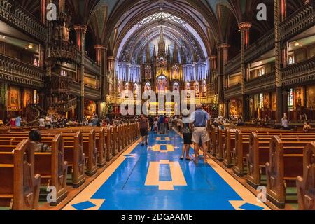 MONTREAL, CANADA - SEPTEMBER , 2020: the magnificent gothic Revival architecture of the interior of Notre-Dame Basilica, Montreal, Quebec, Canada. Stock Photo